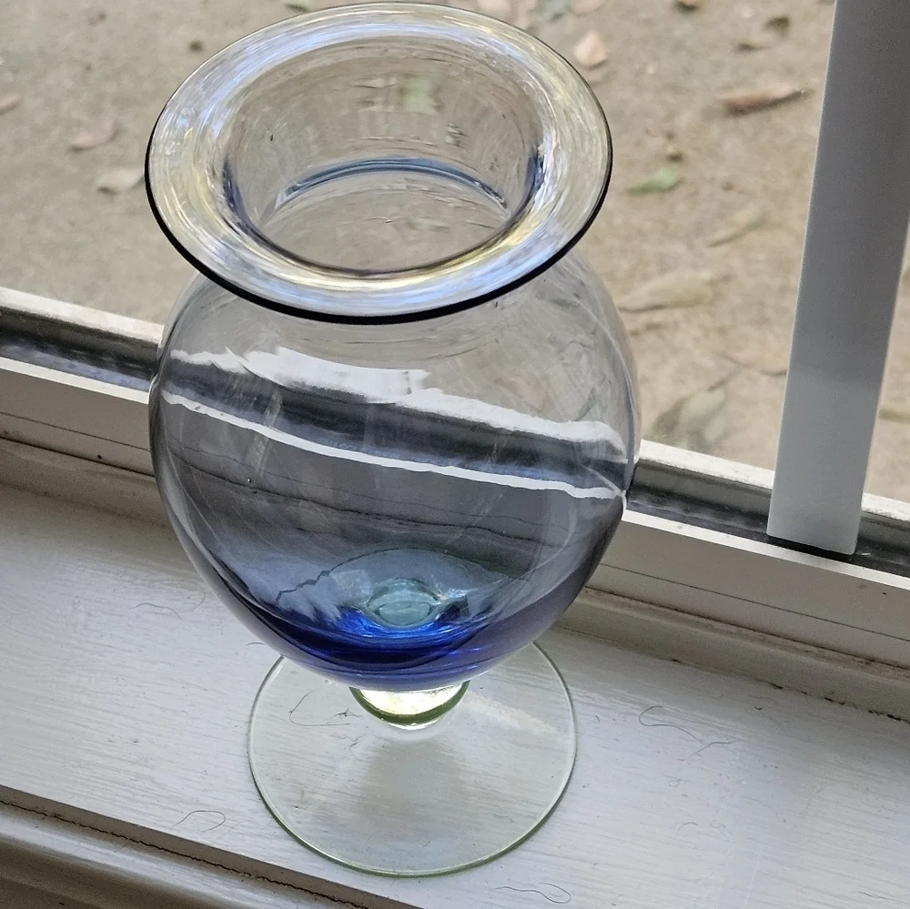 Elegant blue and green glass footed vase.